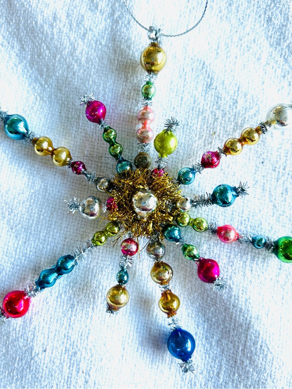 Vintage repurposed holiday star burst Christmas Ornament